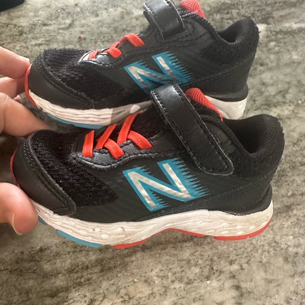 New Balance Kids' Black and Blue Sneakers with Red Accents